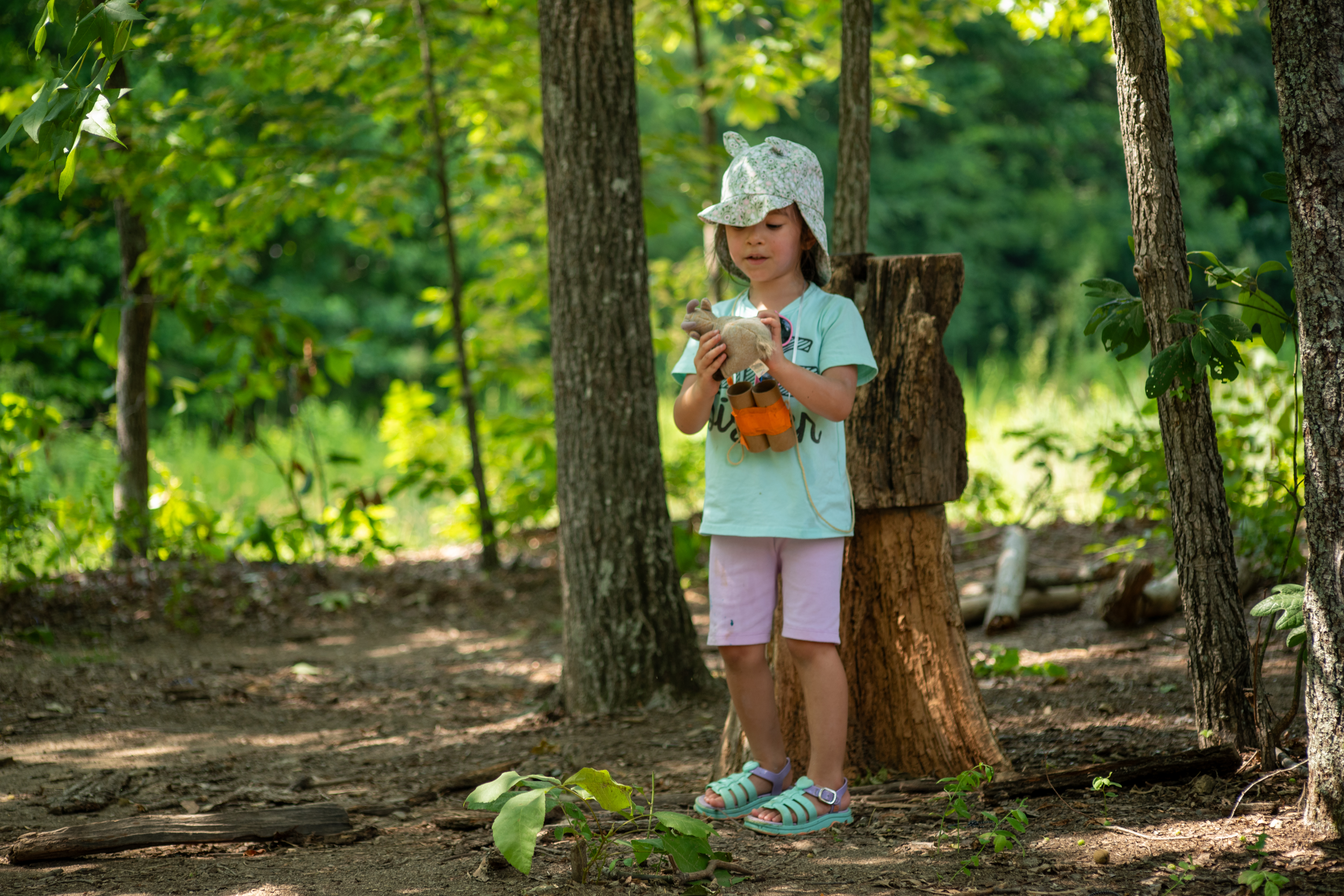 girl in hat found stuffed animal
